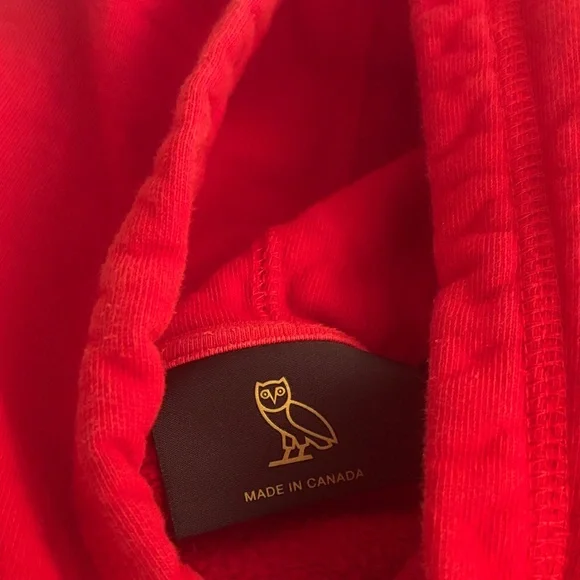 OVO Red Hoodie with Owl and Maple Leaf Design - Picture 2 of 3